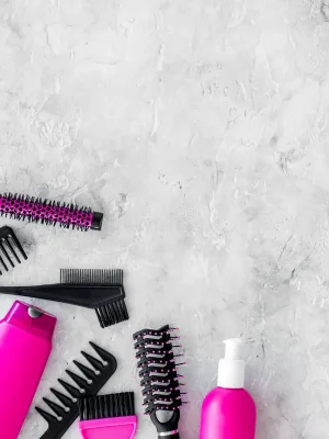 beauty-salon-pink-work-tools-comb-hair-dress-coloring-stone-background-top-view-mock-up-beauty-salon-pink-work-99250208